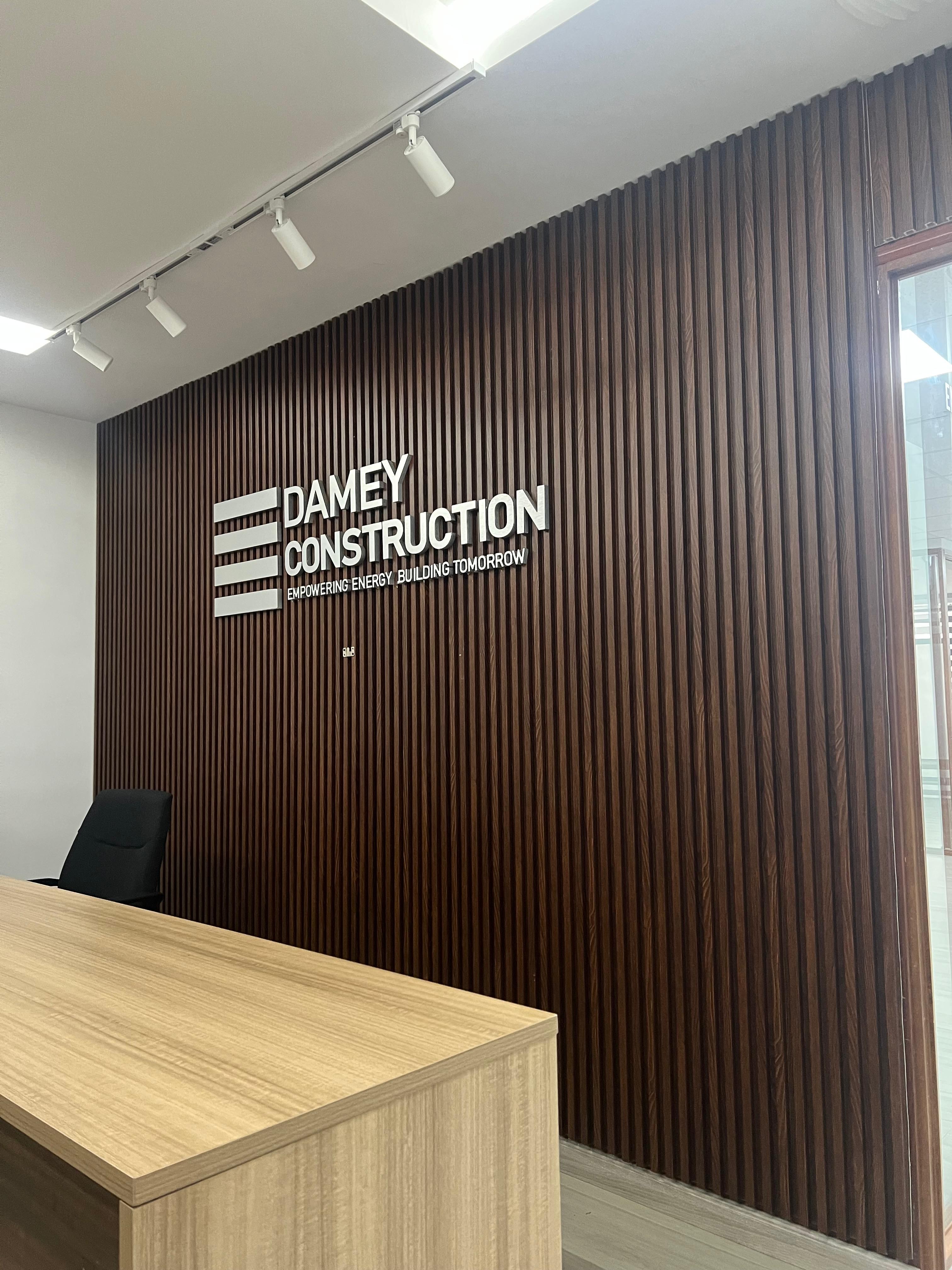 Fluted Panel Wall & Signage — Damey Construction Office